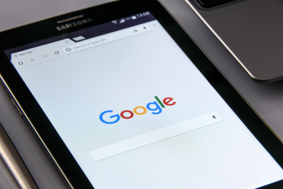 Smartphone displaying a fast-loading website with green performance metrics